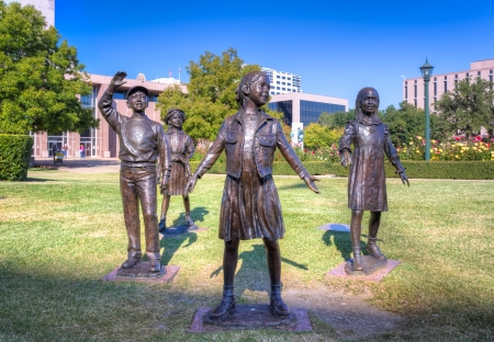 AUSTIN,TX/USA - NOVEMBER 15: Tribute to Texas Children statues on the grounds of the Texas State Capitol celebrating youth of Texas. November 15, 2013.のeditorial素材