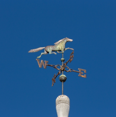 Horse Weather Vane on Top of Barn in United Statesの写真素材