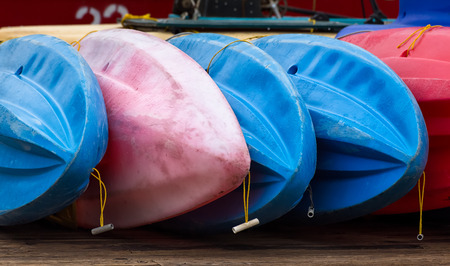 Red and Blue Ocean Kayaks on the Wharfの写真素材