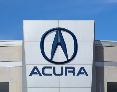 LOS ANGELES, CA/USA - JULY 11, 2015: Acura automobile dealership sign and logo. Acura is the luxury vehicle division of Japanese automaker Honda.のeditorial素材