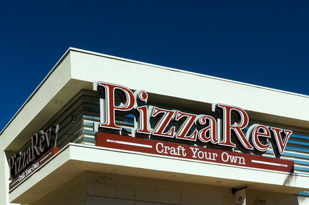 BURBANK, CA/USA - SEPTEMBER 19, 2015: PizzaRev restaurant exterior and sign. PizzaRev is a fast casual chain of franchise pizza restaurants.のeditorial素材
