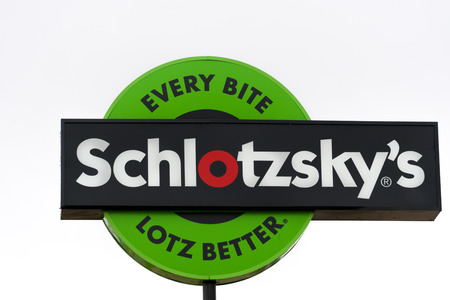 STILLWATER, OK/USA - MAY 20, 2016: Schlotzsky's restaurant exterior and logo. Schlotzsky's is a privately held franchise chain of restaurants, specializing in sandwiches.のeditorial素材
