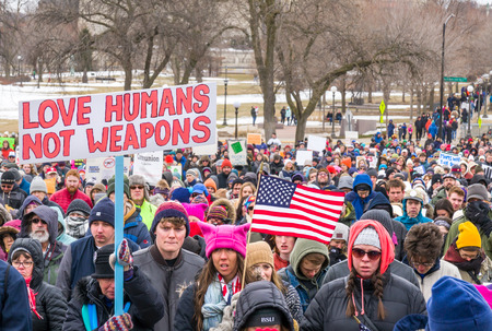 ST. PAUL, MN/USA - MARCH 24, 2018: Unidentified individuals participating in the March for our Lives protest at the Minnesota State Capitol.のeditorial素材