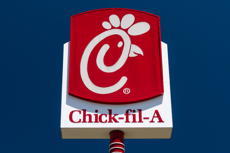 TUSCALOOSA, AL/USA - JUNE 6, 2018: Chick-fil-A restaurant exterior sign. Chick-fil-A is fast food restaurant chain specializing in chicken sandwiches.のeditorial素材