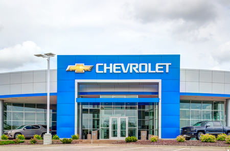 INVER GROVE HEIGHTS, MN/USA - JUNE 17, 2018: Chevrolet automobile dealership exterior and trademark logo. Chevrolet is an American automotive brand.のeditorial素材