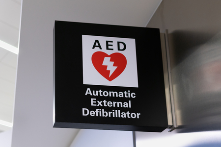 Automated external defibrillator sign and logo. AED is used to treat persons with heart attacks.のeditorial素材