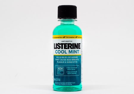 ST. PAUL, MN/USA - FEBRUARY 16, 2019: Listerine mouthwash bottle and trademark logo. Listerine is a brand of antiseptic mouthwash product.のeditorial素材