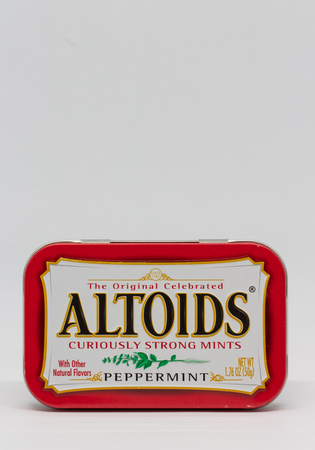 ST. PAUL, MN/USA - FEBRUARY 15, 2019: Altoids mint container and trademark logo. Altoids are a brand of breath mints.のeditorial素材