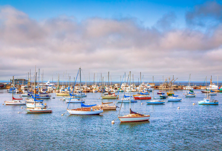 MONTEREY, CA/USA - AUGUST 7, 2014: Historic Monterey Harbor and Marina at dusk.のeditorial素材