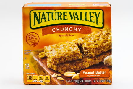 ST. PAUL, MN/USA - FEBRUARY 24, 2019: Nature Valley peanut butter granola bar container and trademark logo. Nature Valley is a brand of granola bars by General Mills.のeditorial素材