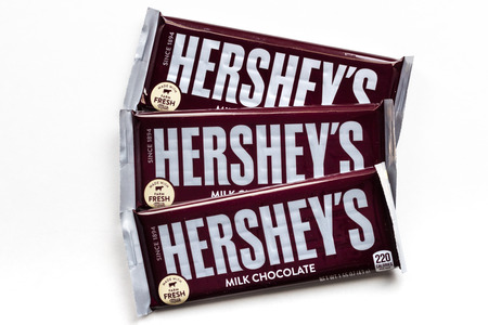 ST. PAUL, MN/USA - FEBRUARY 21, 2019: Grouping of three Hershey's Milk Chocolate candy bars and trademark logo.のeditorial素材