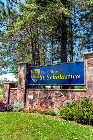 DULUTH, MN/USA - JUNE 16, 2020:  The College of St. Scholastica entrance and trademark campus logo.のeditorial素材