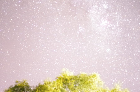 Stars in the night sky with bokeh defocused background.