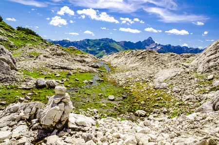 A creek with melting water in the alps.の写真素材