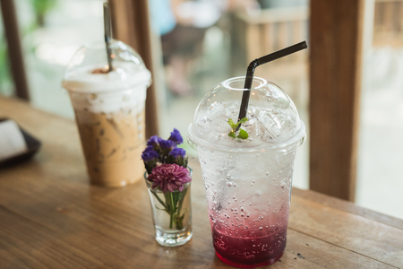 Strawberry soda on wood table backgroundの写真素材