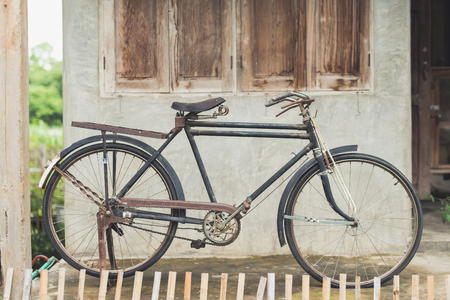 Vintage bicycle at old houseの写真素材