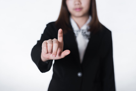 Business woman hand pushing buttonの写真素材