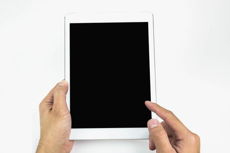 man hand holding tablet isolated on white background