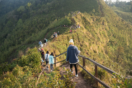 December 12, 2016 Traveler walking to travel on themountain at Phucheedaow mountain at Chiang rai, Thailandのeditorial素材