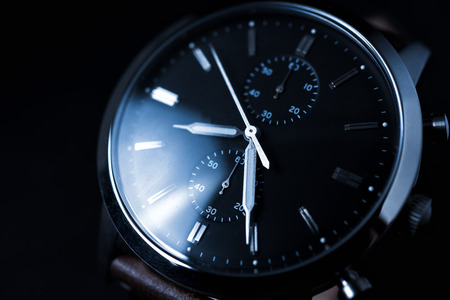 man watch on black backgroundの写真素材