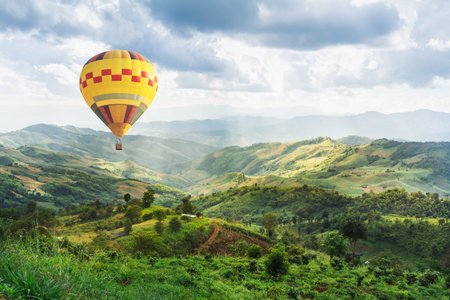balloon over the mountain and blue skyの写真素材