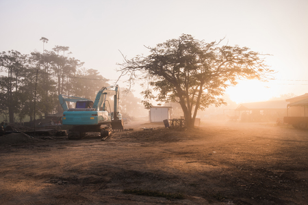 back hoe car morningの写真素材