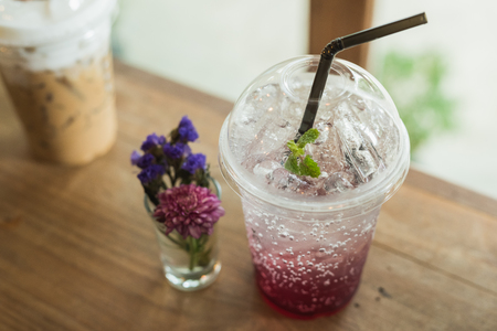 Strawberry soda on wood table backgroundの写真素材