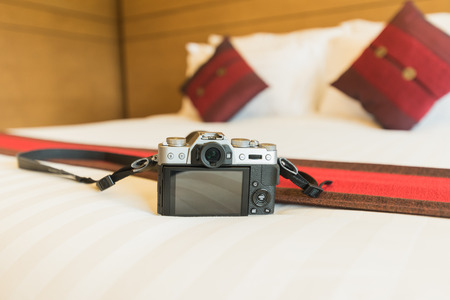 camera on bed in the bedroomの写真素材