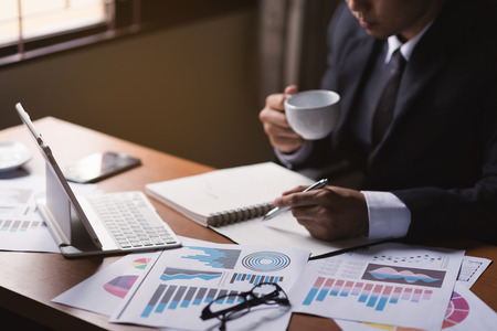 Businessman working on desk office businessの写真素材