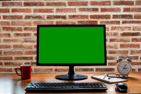 office table on brick wall background