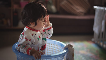 portrait of cute baby in basket