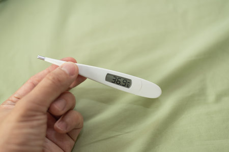 close up of thermometer  on the bed, COVID-19, nCoV,  virus concept