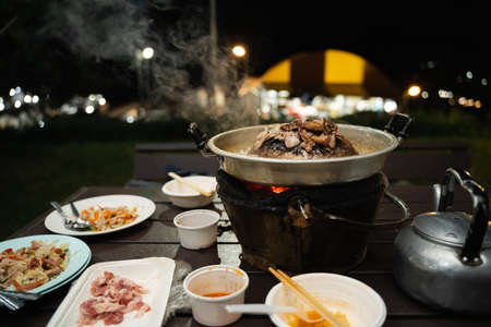 Thai barbecue Grill Pork on hot pan buffet, Moo-gata traditional Thai style BBQの写真素材