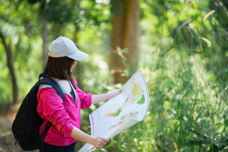 traveller woman hiking in the forest