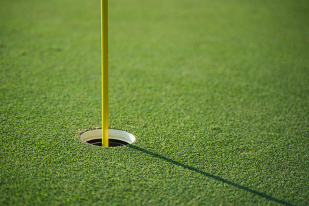 Golf hole on green grass, sport conceptの写真素材