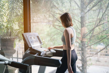 beautiful women exercise training with dumbbell in the gym, sport fitness conceptの写真素材