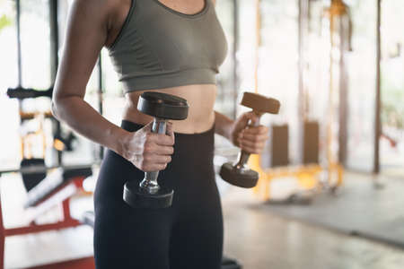 beautiful women exercise training with treadmill in the gym, sport fitness conceptの写真素材