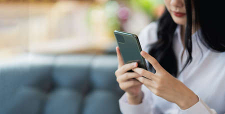 Business asian woman feel tired and serious and working with laptop. Depression asian woman working hard.の写真素材