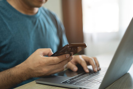 Man using fingerprint scan provides security access with biometrics identification on screen and...