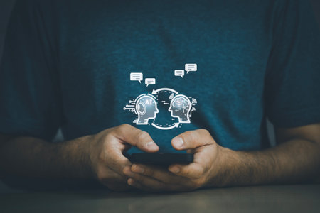 Man using smartphone mobile phone with digital chatbot, chat GPT, robot application, conversation assistant, AI Artificial Intelligence concept, digital chatbot virtual screen. Automatic AI Concept.の写真素材