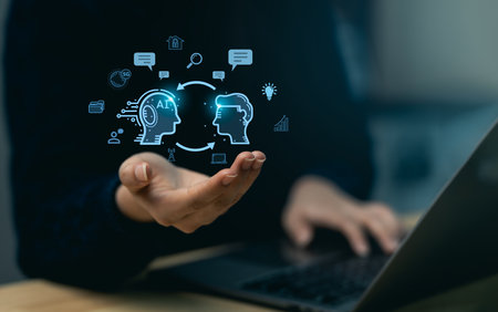 Explore the dynamic relationship between artificial intelligence and human intelligence in a modern workspace, featuring digital graphics and engaging concepts.の写真素材