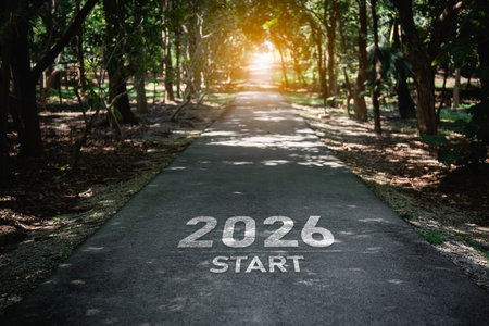 Inspirational Path with Marking on Road Surrounded by Green Trees, Symbolizing Journey and Future...