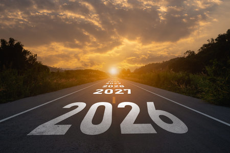 A serene road displaying the years 2021 to 2026 leads towards a beautiful sunset, symbolizing hope,...