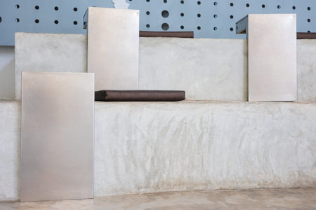 Front view of step or slope seat decorated in modern loft style with earth tone color and metallic...