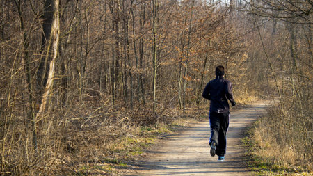Runner on the forest road