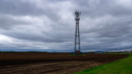 Brno, Czech Republic - May 02, 2021: Mobility transmitter in the field landscapeの写真素材