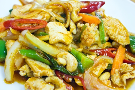 Stir fry chicken and chili in oilの写真素材