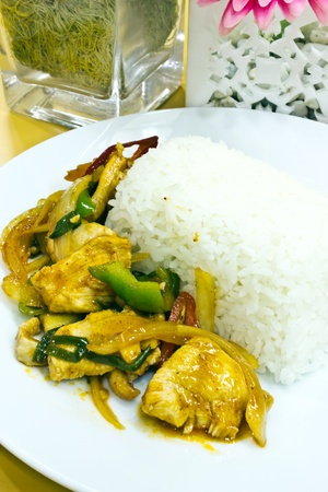 Stir fry chicken and chili in oil の写真素材