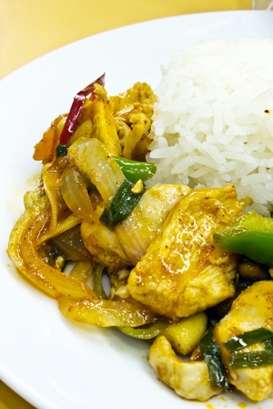Stir fry chicken and chili in oil の写真素材