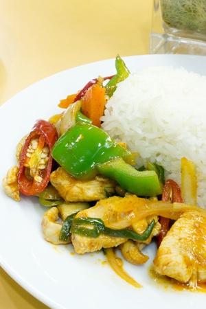 Stir fry chicken and chili in oil の写真素材
